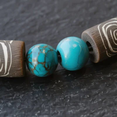 Covenant No. 02 — Mineral Covenant Detail Covenant No. 02 macro detail revealing the etched "eyes" of Tibet Dzi and the iron-rich matrix of Hubei Turquoise.