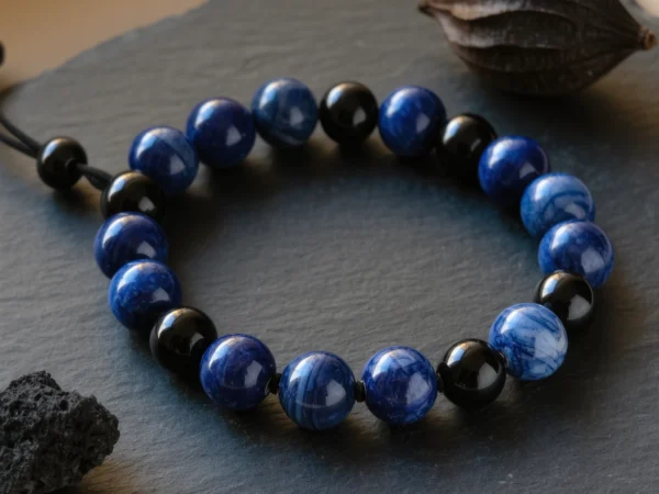 Covenant No. 05 — Astral Path Primary Narrative Covenant No. 05: Astral Path hand-knotted bracelet featuring Henan Kyanite and Tibet Obsidian.