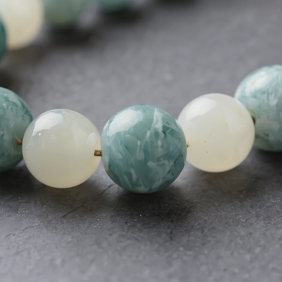 Fluidity No. 04 — Macro Material Witness Fluidity No. 04 macro detail highlighting the vibrant turquoise-green energy of Fujian Amazonite and the oily luster of Xinjiang Nephrite Jade.