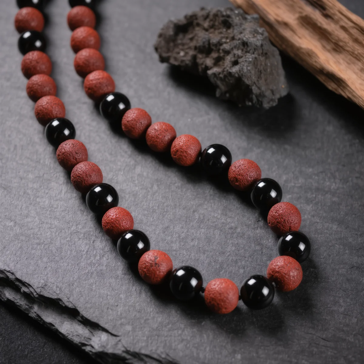 Fortress No. 01 — Iron Guard Primary Narrative Fortress No. 01: Iron Guard hand-knotted necklace featuring Guizhou Cinnabar and Tibet Obsidian.