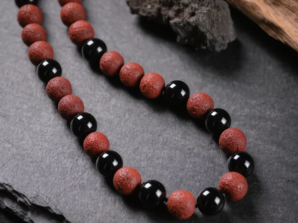 Fortress No. 01 — Iron Guard Primary Narrative Fortress No. 01: Iron Guard hand-knotted necklace featuring Guizhou Cinnabar and Tibet Obsidian.