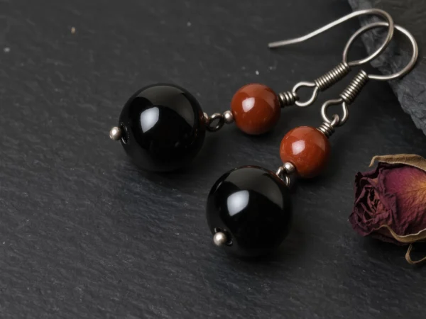 yuano-fortress-no-03-eternal-guard-earrings-obsidian-cinnabar-main.webp Fortress No. 03: Eternal Guard hand-knotted earrings featuring Tibet Obsidian and Guizhou Cinnabar.