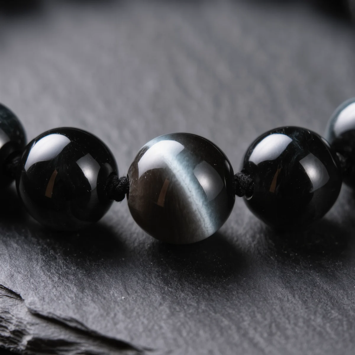 Fortress No. 05 — Mineral Fortification Detail Fortress No. 05 macro detail revealing the chatoyant fiber of Black Tiger Eye and the glassy void of Tibet Obsidian.