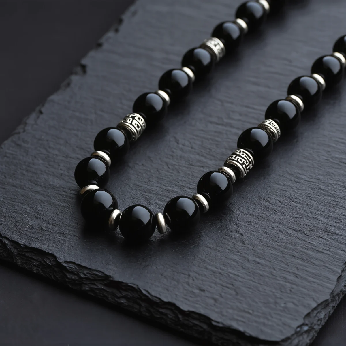 Fortress No. 07 — Night Sentinel Primary Narrative Fortress No. 07: Night Sentinel hand-knotted necklace featuring Tibet Obsidian and Mantra-engraved silver.