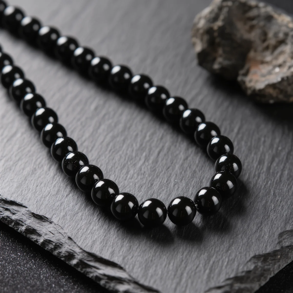 Fortress No. 09 — Obsidian Wall Primary Narrative Fortress No. 09: Obsidian Wall hand-knotted necklace featuring Tibet Obsidian and Black Agate.