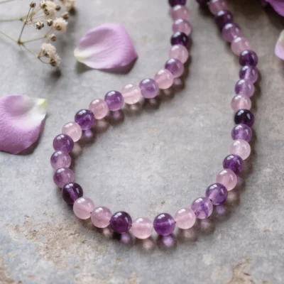 Serenity No. 10 — Celestial Love Primary Narrative Serenity No. 10: Celestial Love hand-knotted necklace featuring Donghai Rose Quartz and Donghai Amethyst.